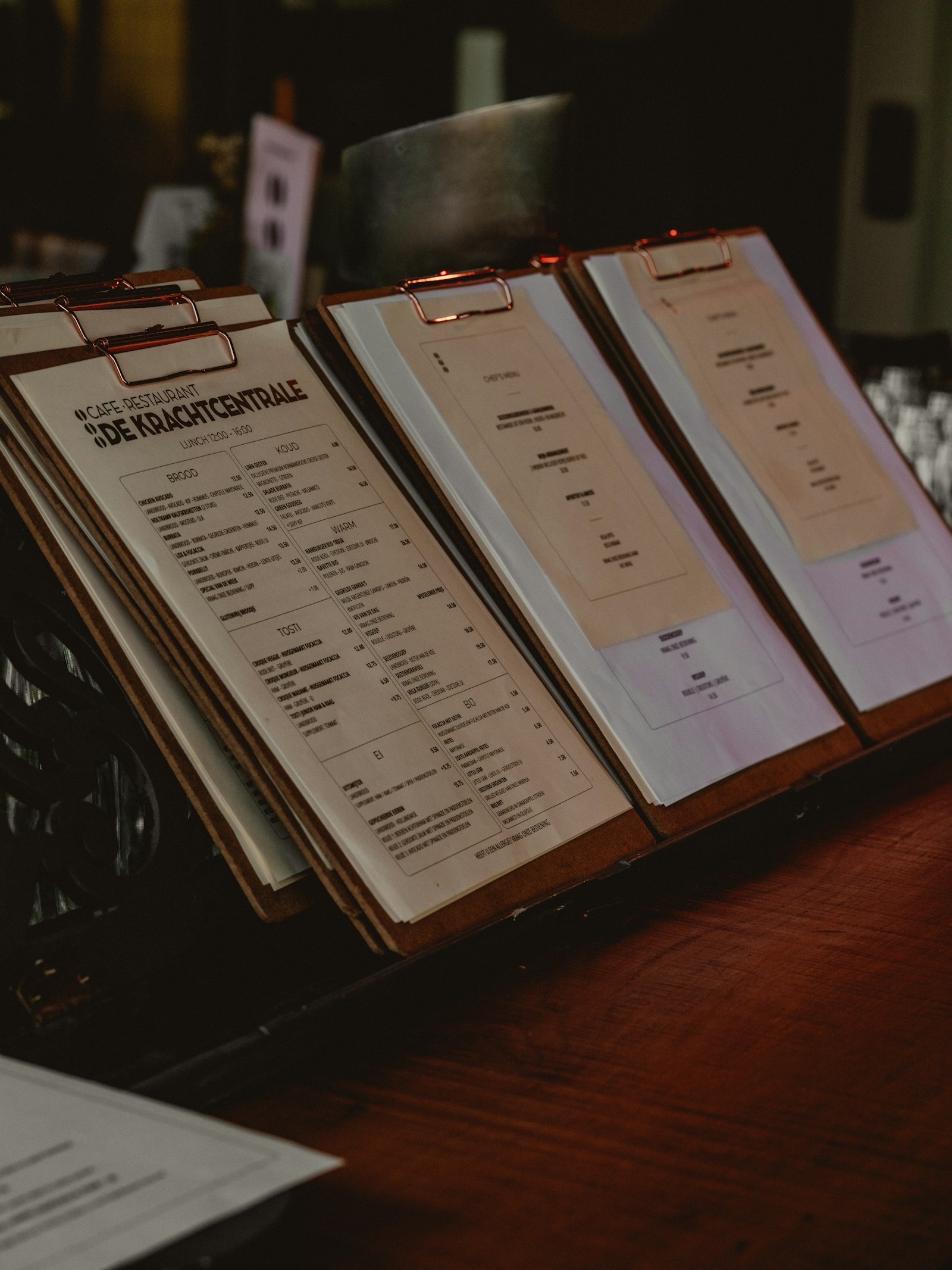 Printed cafe menus on clipboards